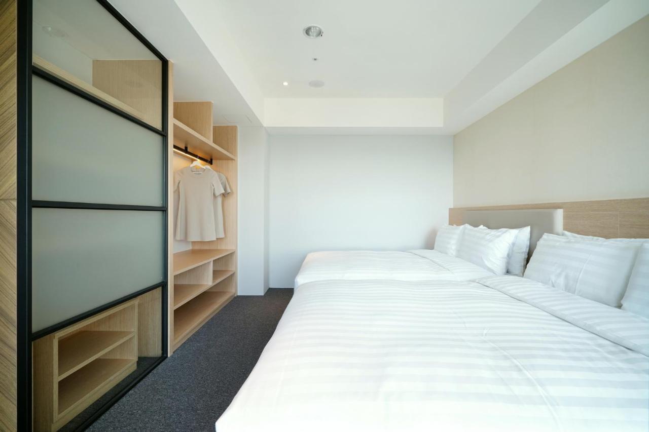 E Hotel Xinshi Esterno foto