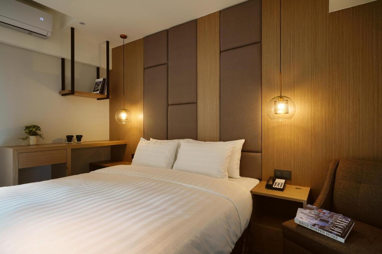 E Hotel Xinshi Esterno foto