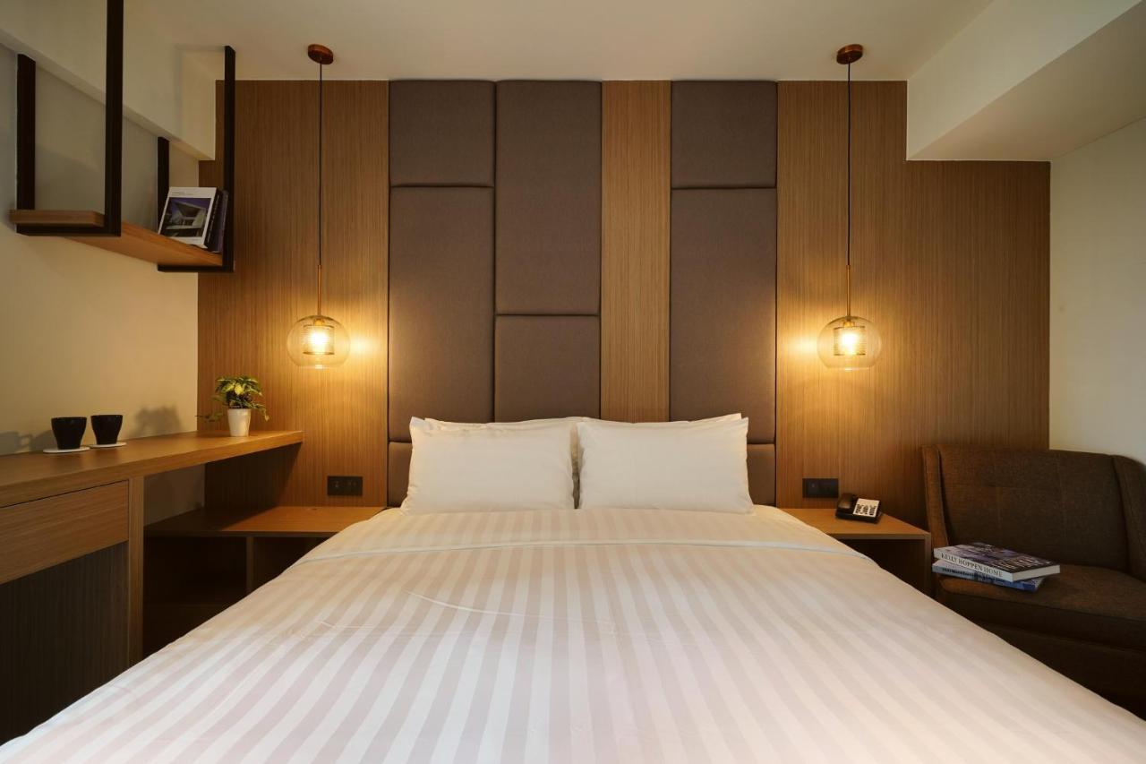 E Hotel Xinshi Esterno foto